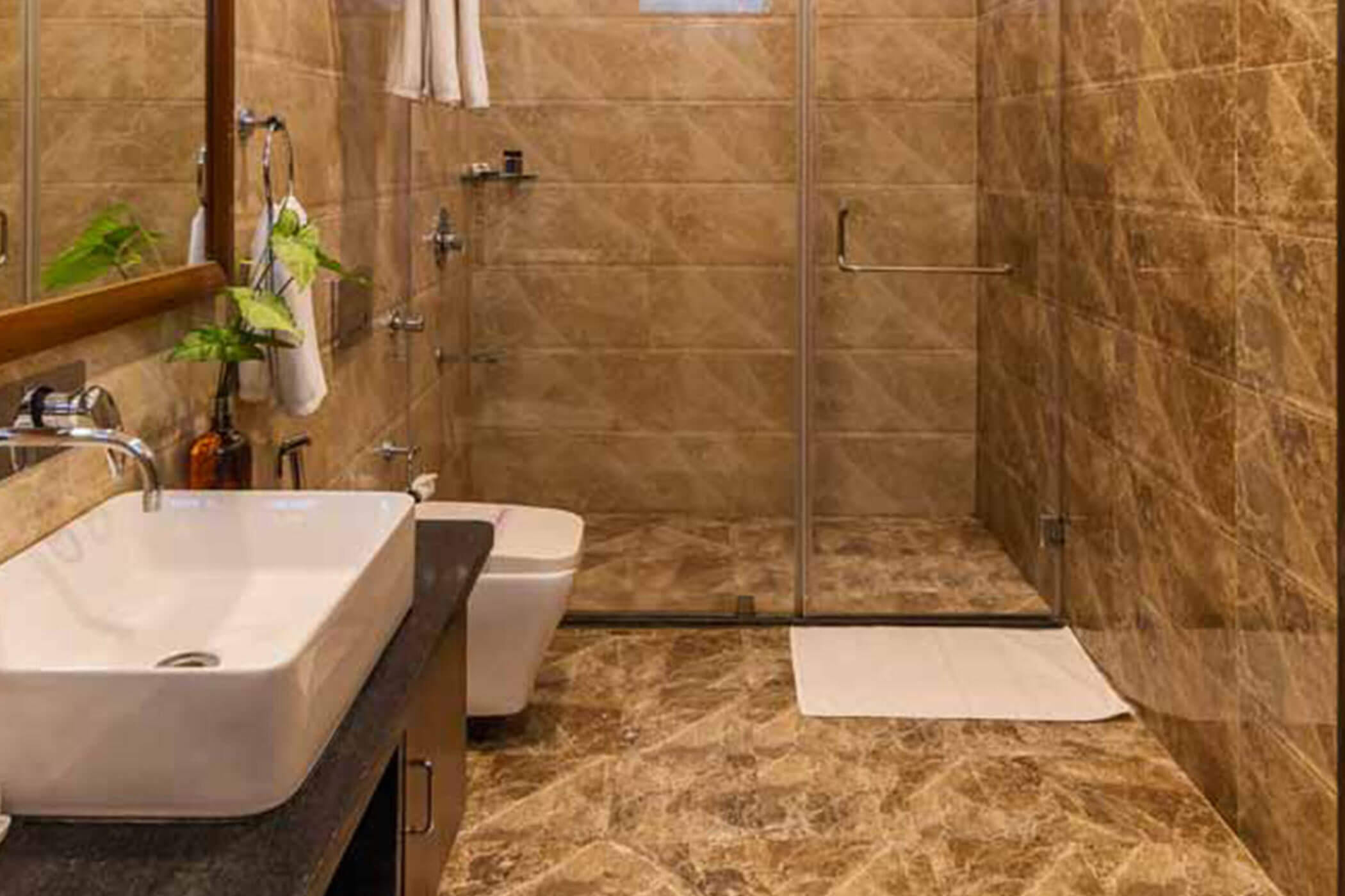 Bathrooms are en-suite and spacious. There’s a separate shower cubicle and running hot-water round the clock.

